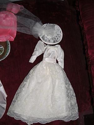 I need help identifying a tagged vintage barbie wedding dress with hat veil