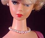 Vintage Barbie wearing Pink Graduated Pearl Necklace